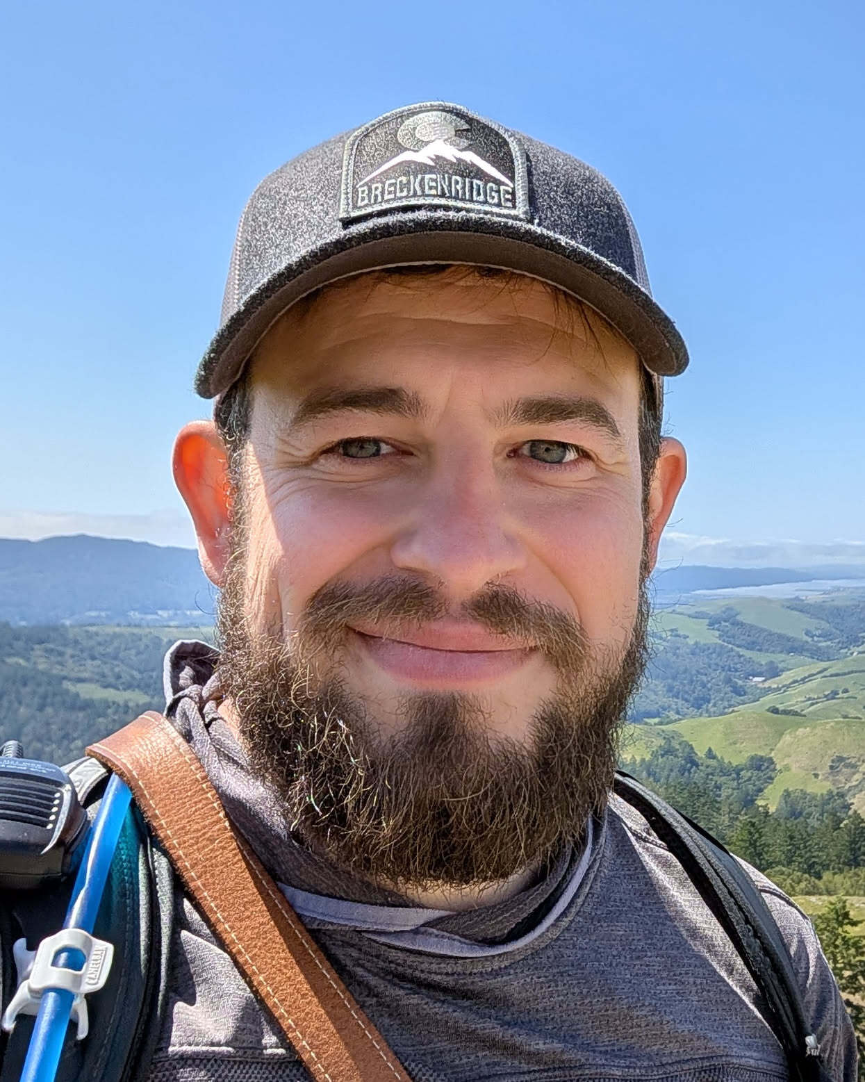 Portrait of Kellen outdoors.